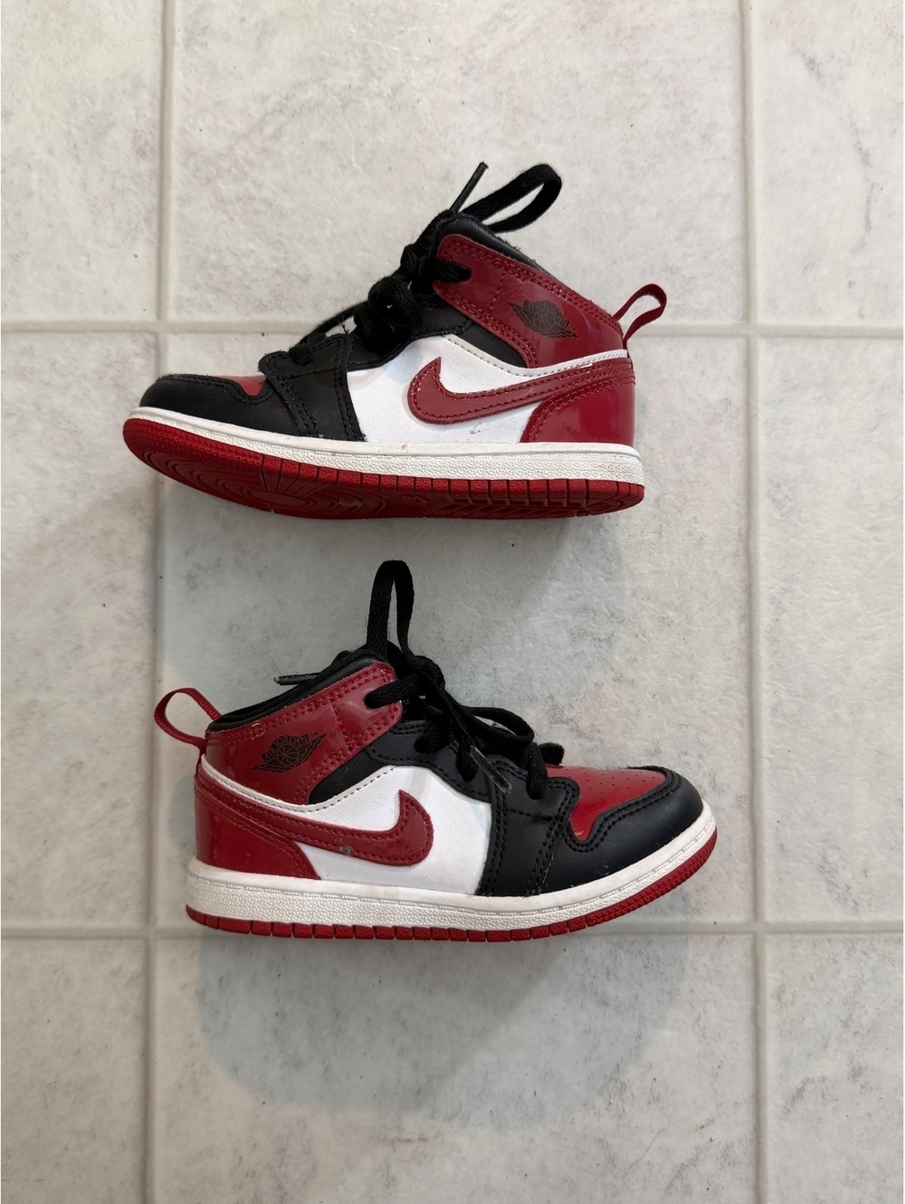 Nike red black and white high top sneakers